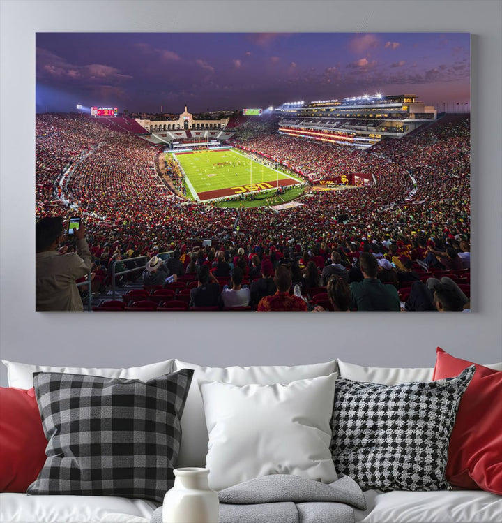 The vibrant wall art canvas print captures the USC Trojans playing under lights at dusk in LA Memorial Coliseum.