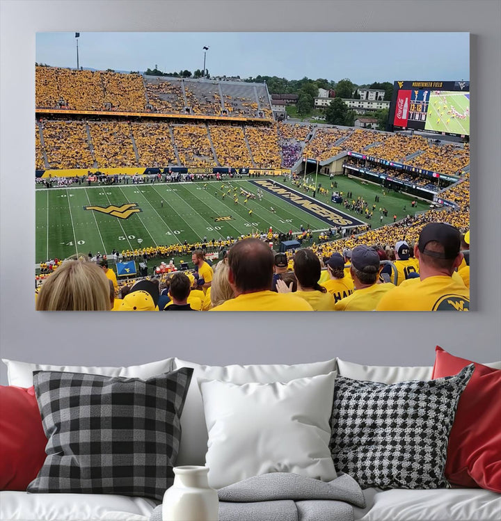 A Puskar Stadium canvas print decorates the modern living room shelf.