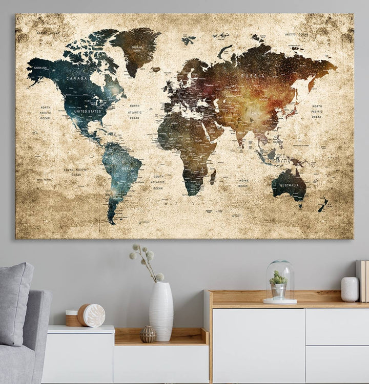 Vintage World Map Canvas Wall Art, perfect for antique-style decor, displayed against a light wood wall.