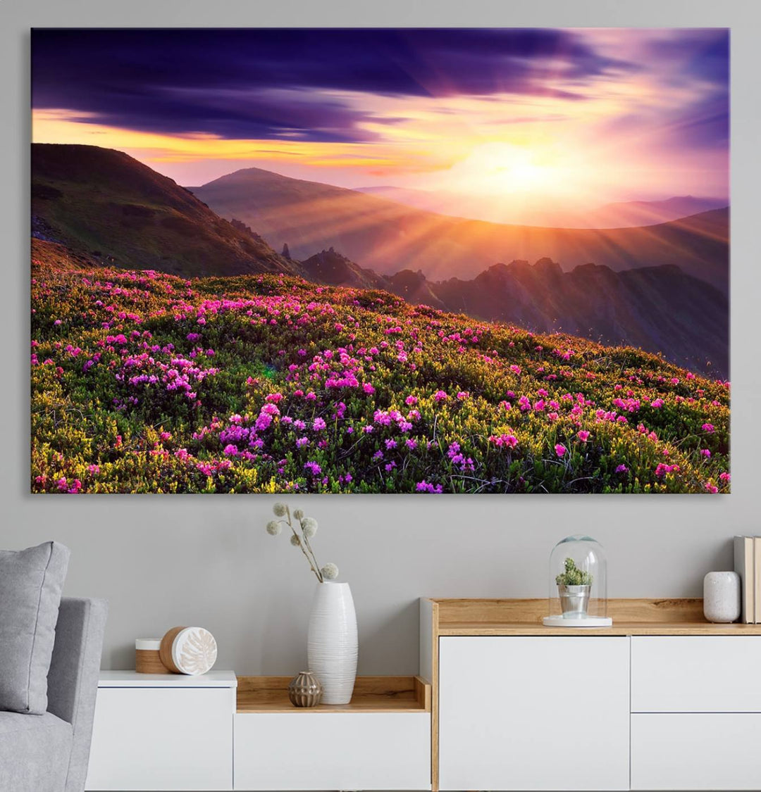 Gallery-wrapped wall art of a stunning mountain sunset and purple flowers.