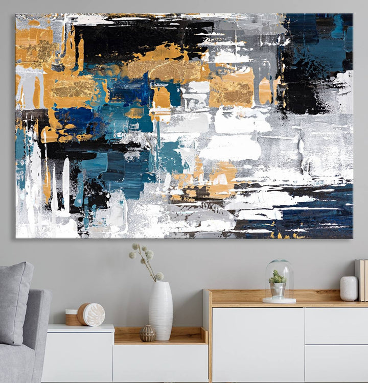 Blue and Gold Abstract Canvas Wall Art hangs prominently.