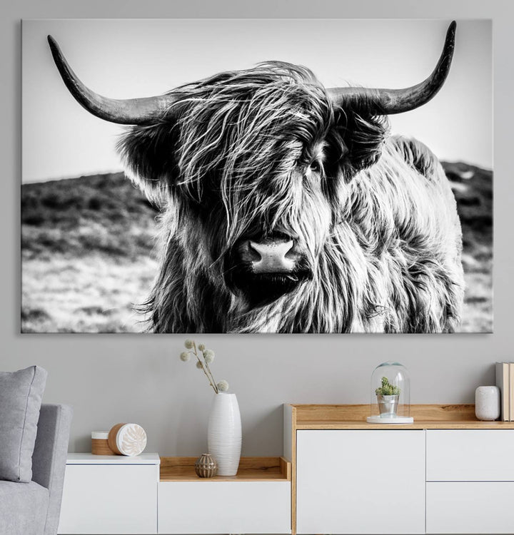 A Black and White Scottish Cow Canvas Print adorns the kitchen wall, perfect for farmhouse decor.