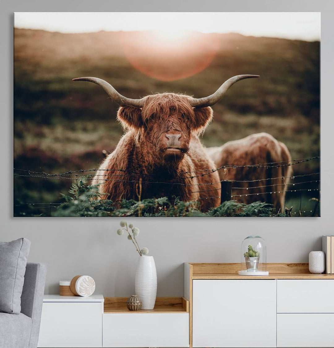 A Highland Cow Animal Canvas Wall Art, featuring a grassy field, is displayed on the wall.