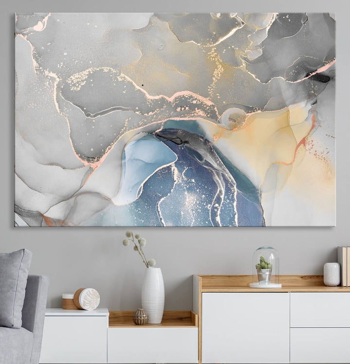 Gray Marble Fluid Effect Abstract Canvas with swirls of gray, gold, and blue.