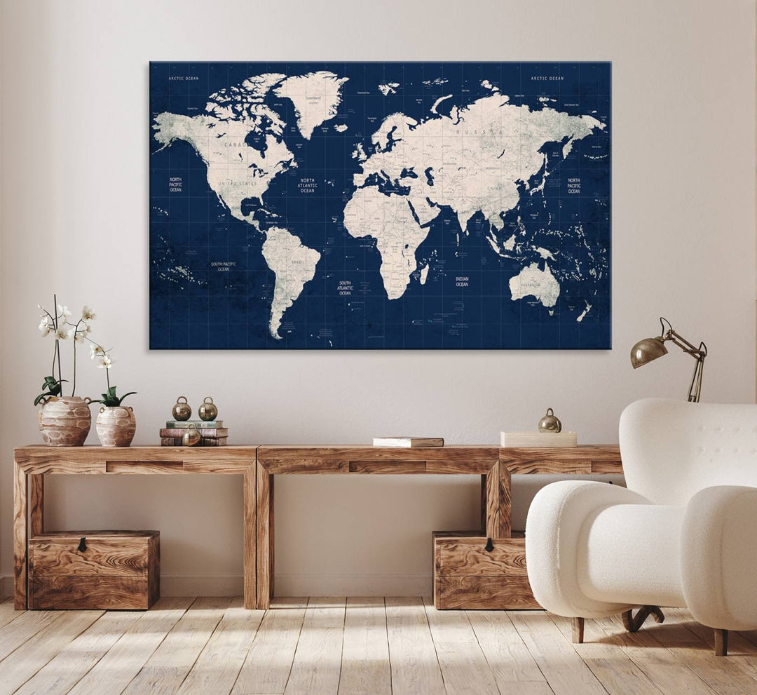 Large modern world map wall art canvas print in beige and navy; showcases a 3-panel vintage map design and is ready to hang.