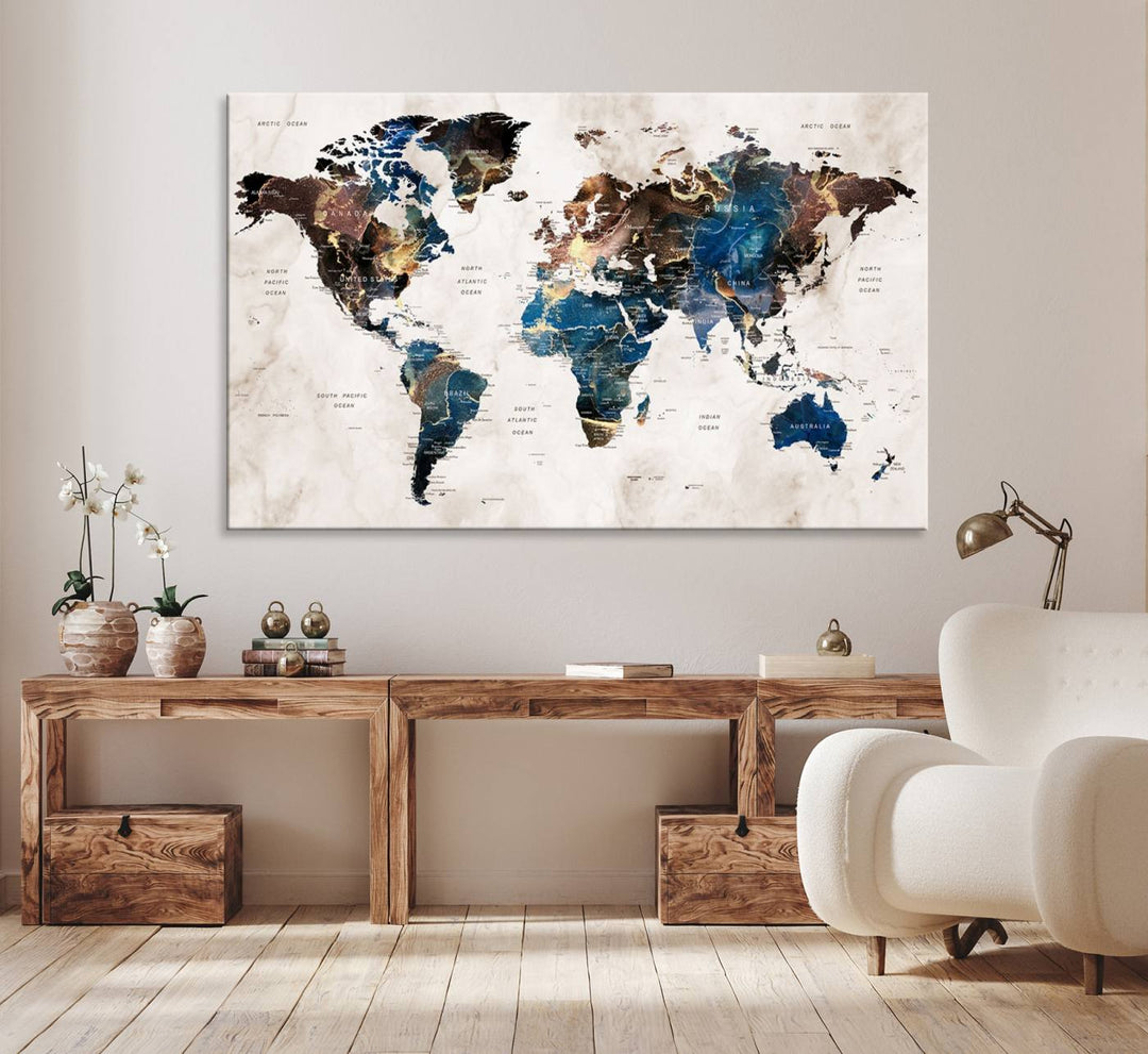 Abstract earth-toned 3-panel world map wall art featuring blues and browns, ready to hang; it showcases continents on modern canvas.