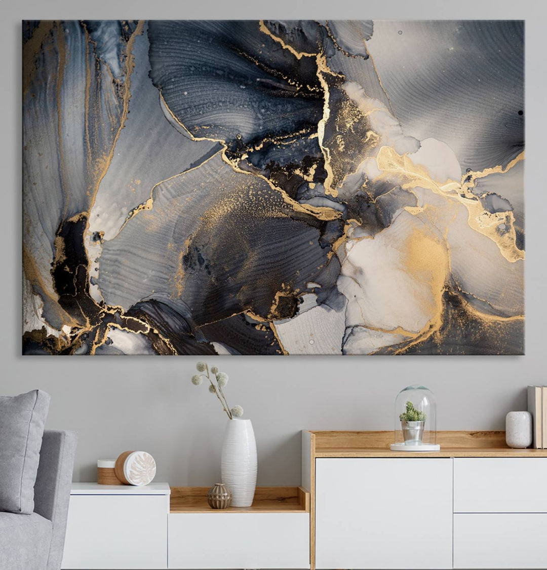 A Modern Marble Fluid Effect Abstract Wall Art with black, white, and gold swirls hangs in a modern kitchen.