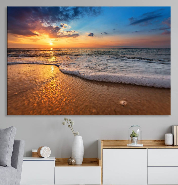 The Golden Sunset Beach Waves Triptych adds a modern coastal touch with its stunning seascape.