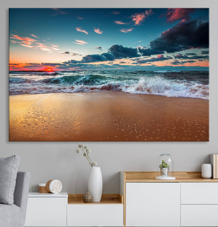 A large 3-panel sunset ocean beach canvas is displayed above the counter.