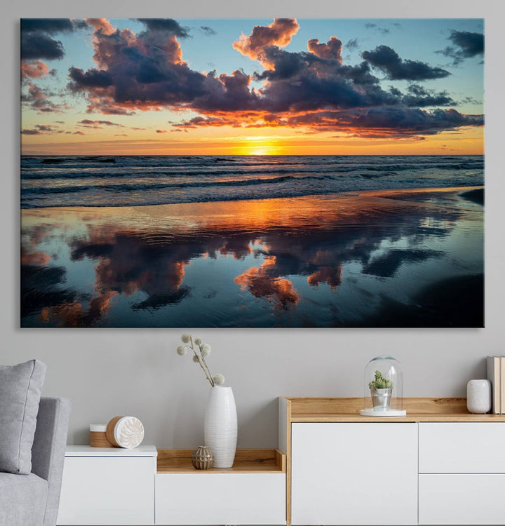 A Beach Sunset Print - Stunning Ocean Canvas Artwork adorns the wall.