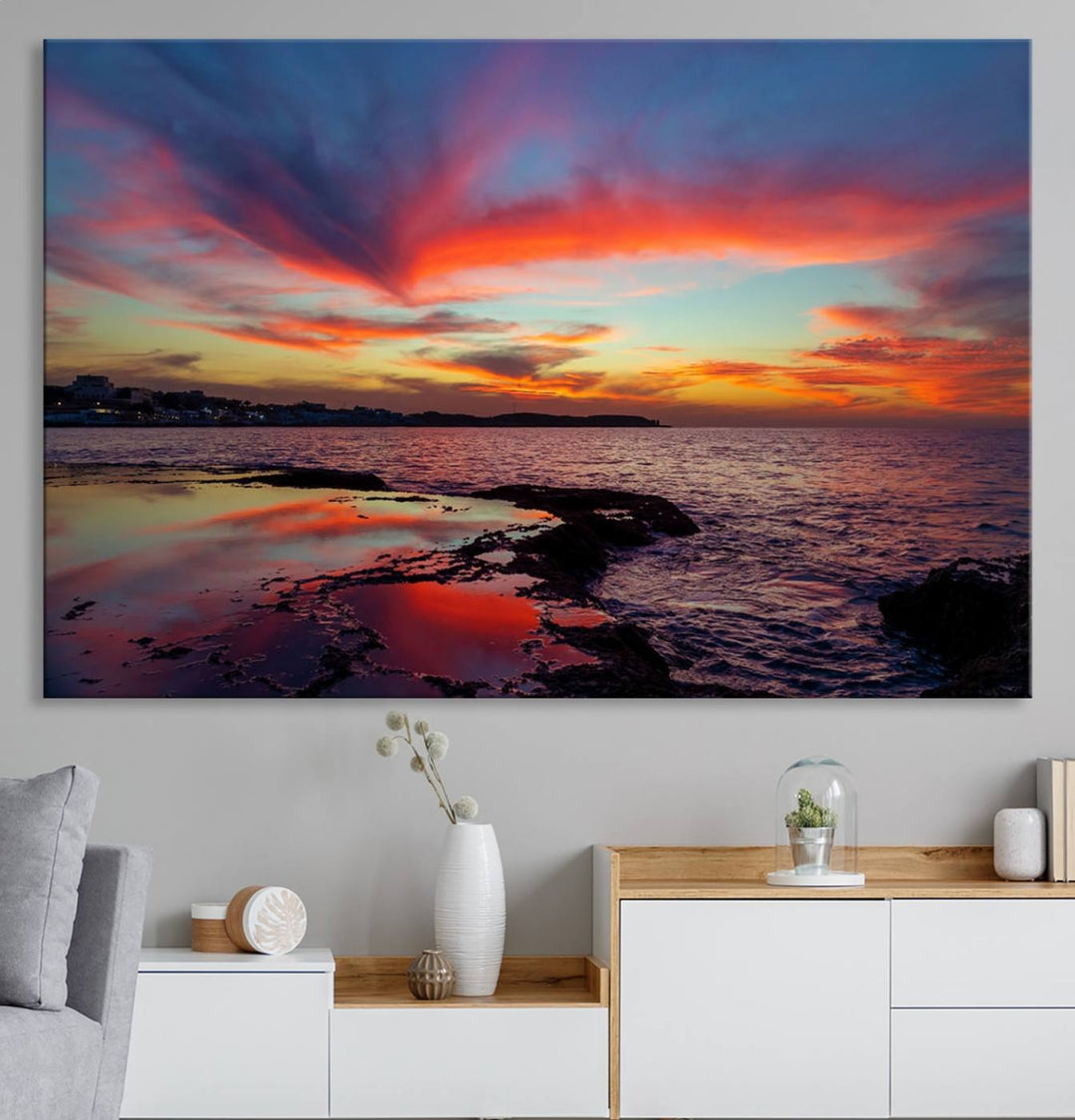 The Glorious Sunset on The Beach canvas print adorns the dining room.