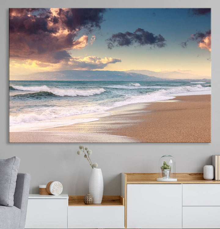 The dining area is enhanced with the Cloudy Weather Beach Sunset Canvas Print.