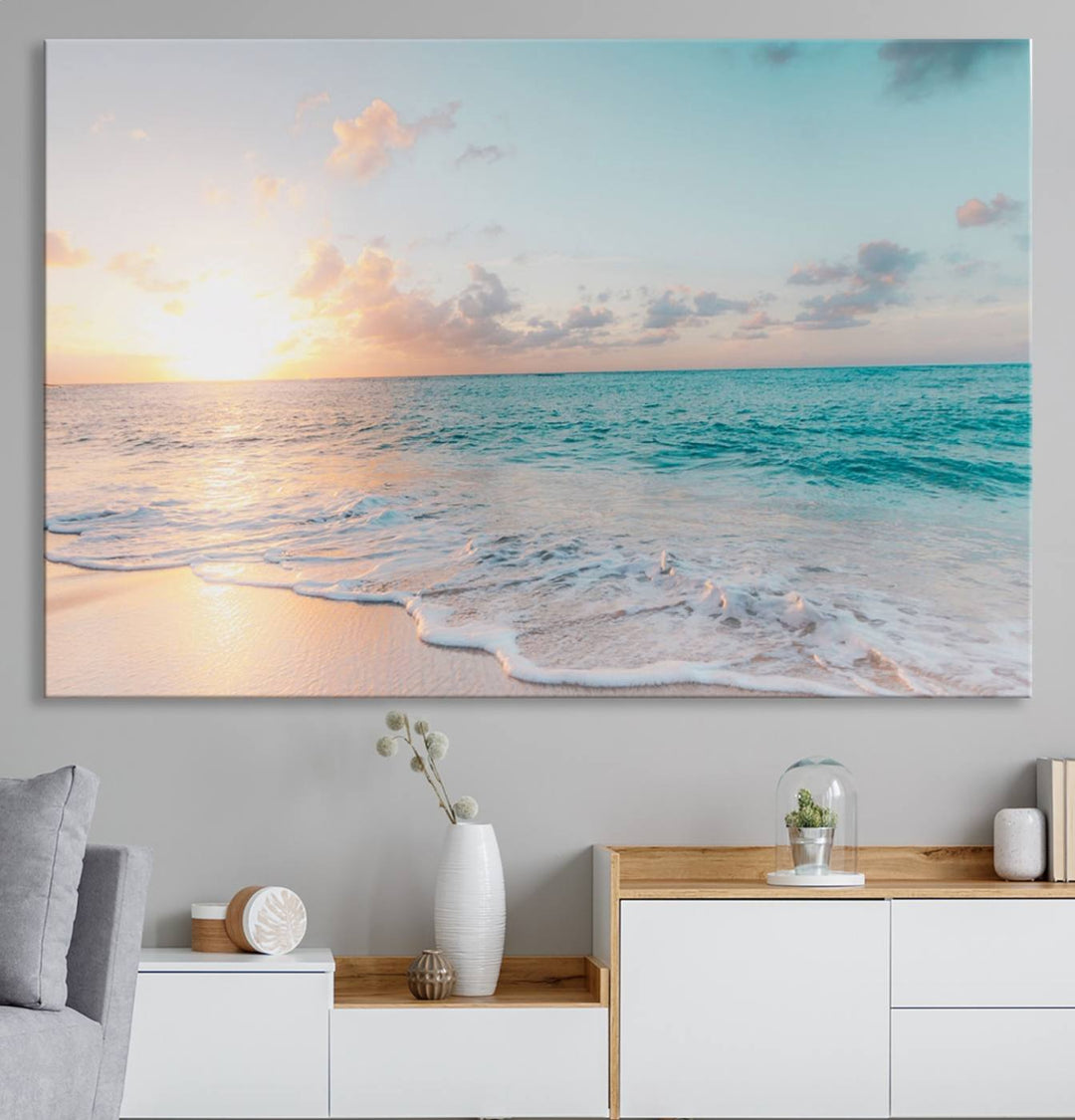 The room features a 3-panel Tranquil Ocean Beach Sunset Canvas Wall Art.