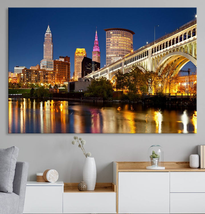 The Cleveland City Lights Canvas showcases a lit-up bridge and cityscape at night.