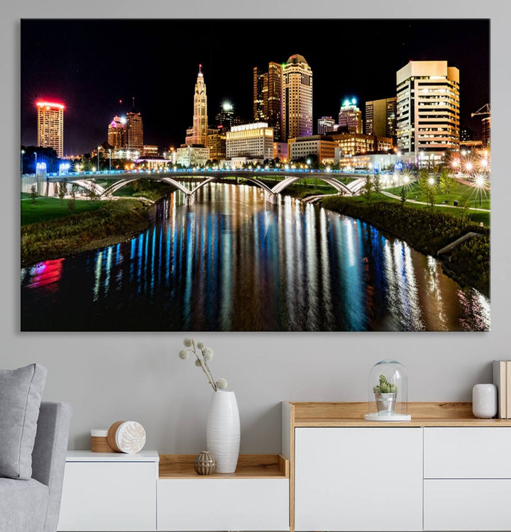 The Columbus City Lights Night Skyline Wall Art Canvas Print adorns the wall.