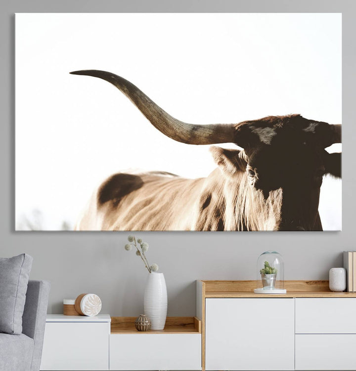 A 3-panel Texas Longhorn canvas adds a touch of rustic Western decor.