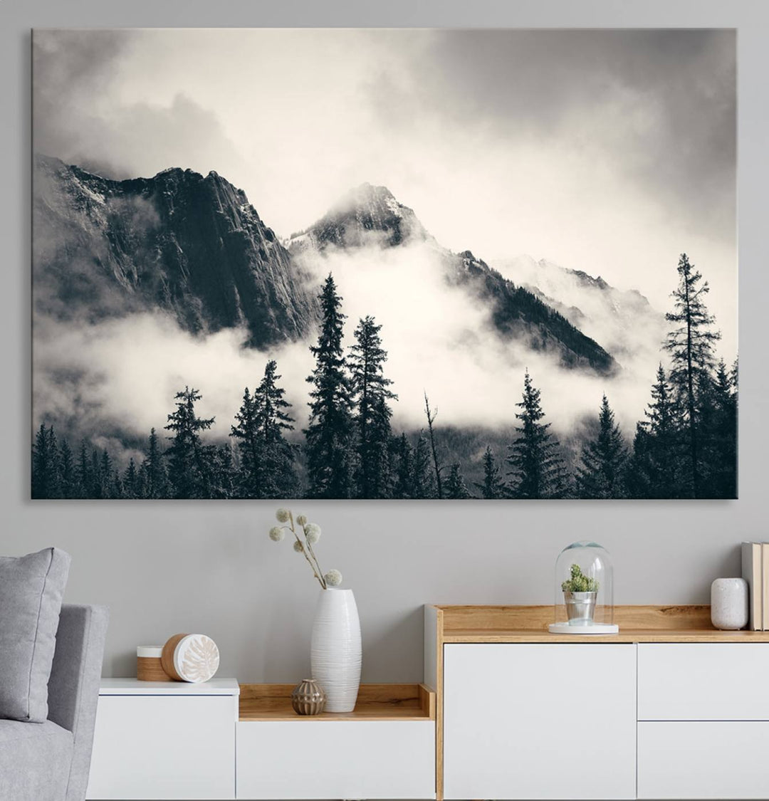 A large foggy mountain forest canvas print hangs prominently in the room.