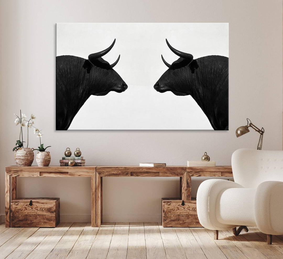 Spanish Bull Wall Art Canvas Print: Two black bull heads facing off on museum-quality canvas.