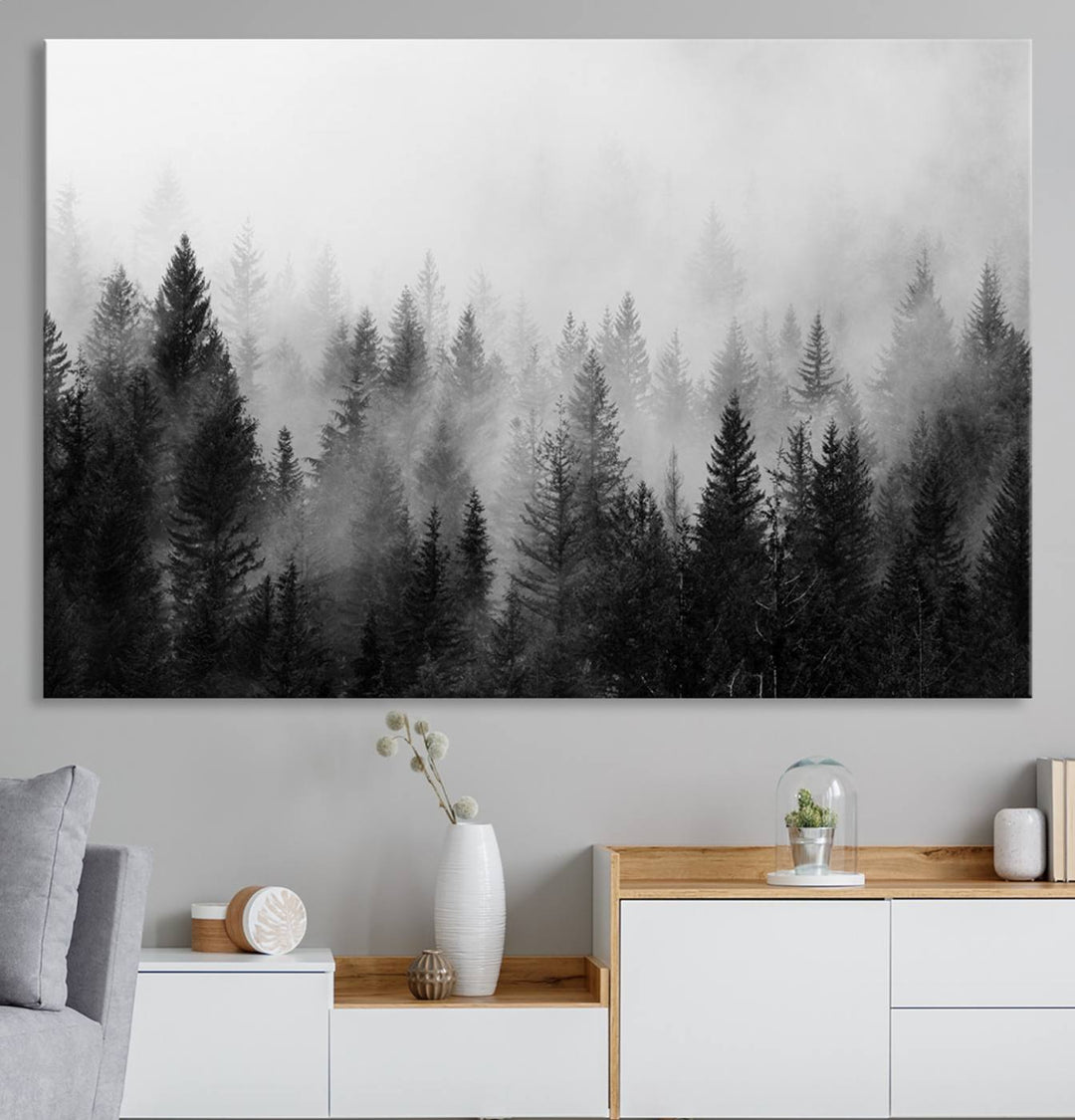 The Foggy B&W Forest Wall Art, featuring pine trees, enhances the minimalist kitchen ambiance.