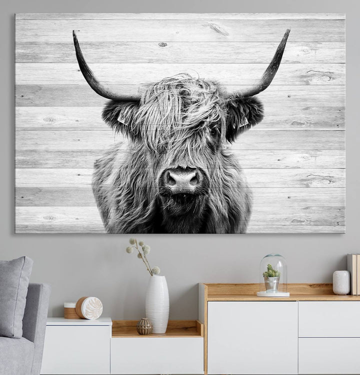 Scottish Highland Cow Cattle Art adds rustic farmhouse charm to the space.