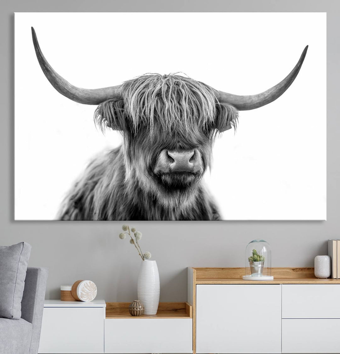 A Scottish Highland Cow Art Canvas adds charm to the farmhouse decor.