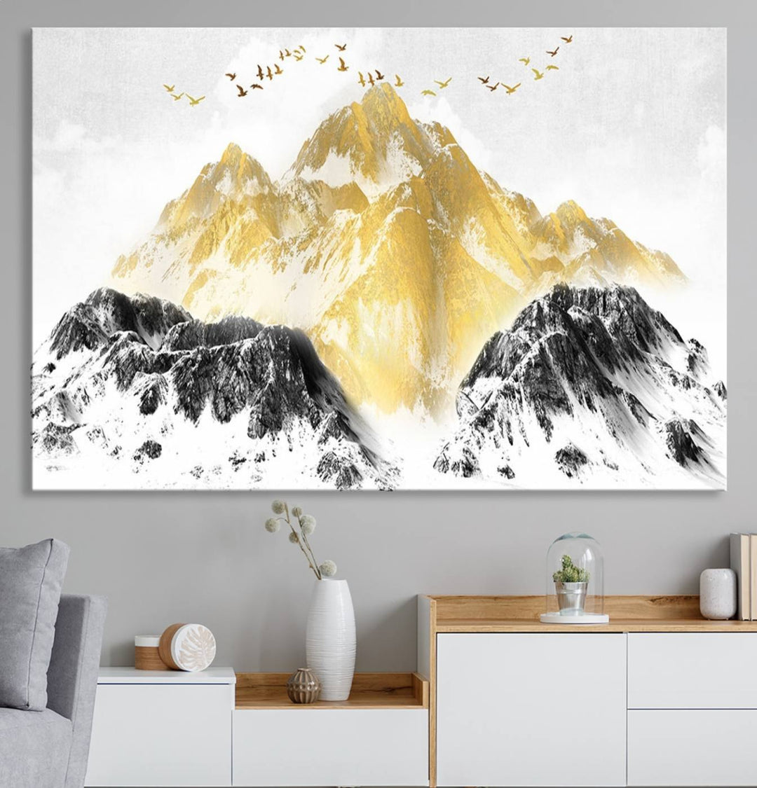 Golden Mountain Triptych Wall Art features gold-tinted mountains and birds.