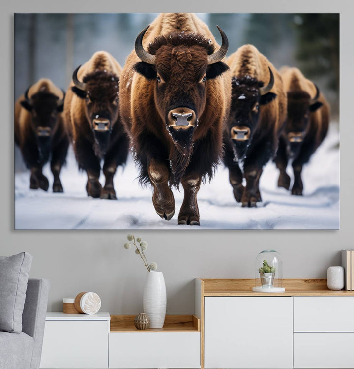 The dining room features an American Bison Herd Canvas Print against the snow.