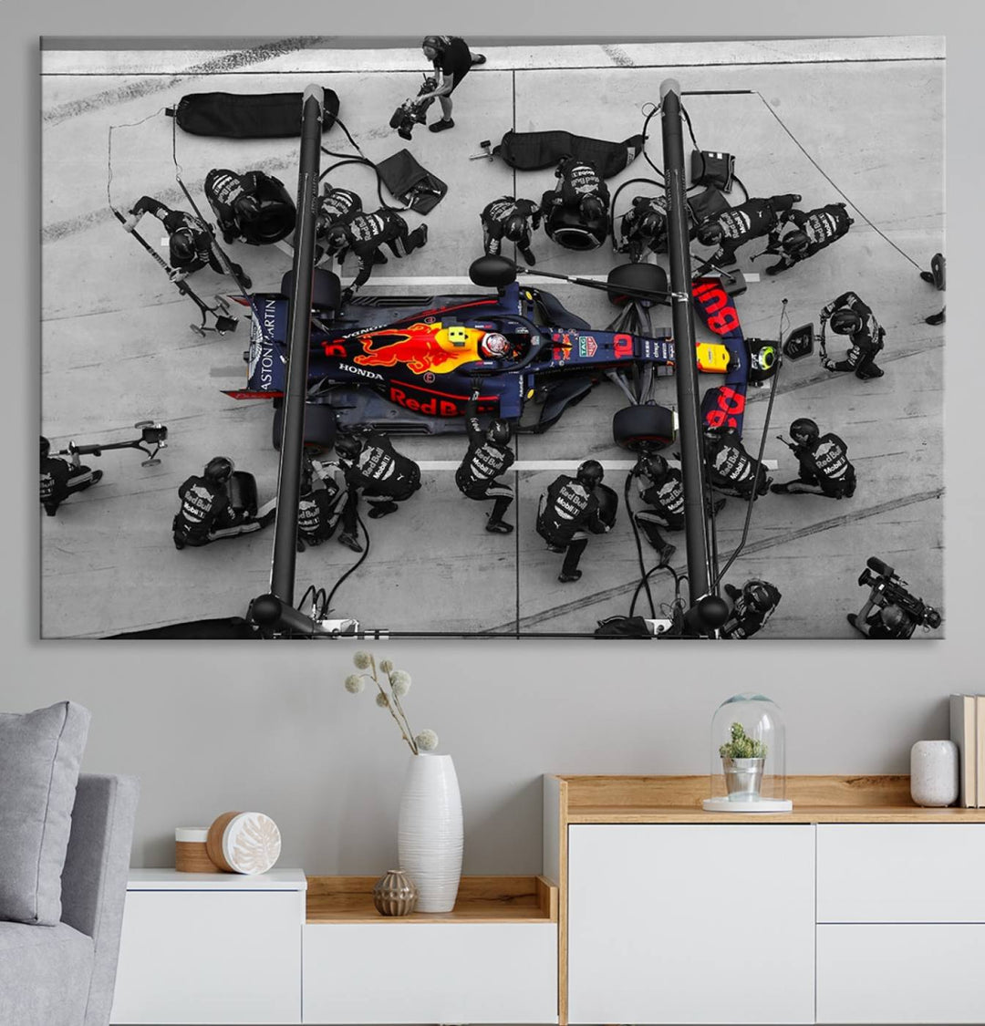 Red Bull Formula 1 Canvas Wall Art Print: An aerial view of a Formula 1 pit stop featuring a Red Bull car on premium canvas.