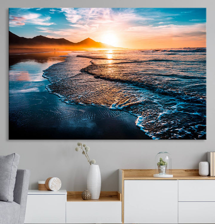 The Sunset Beach Ocean Canvas Wall Art – Tranquil Reflections at Dusk enhances the ambiance with its captivating depiction of serene ocean views at dusk.