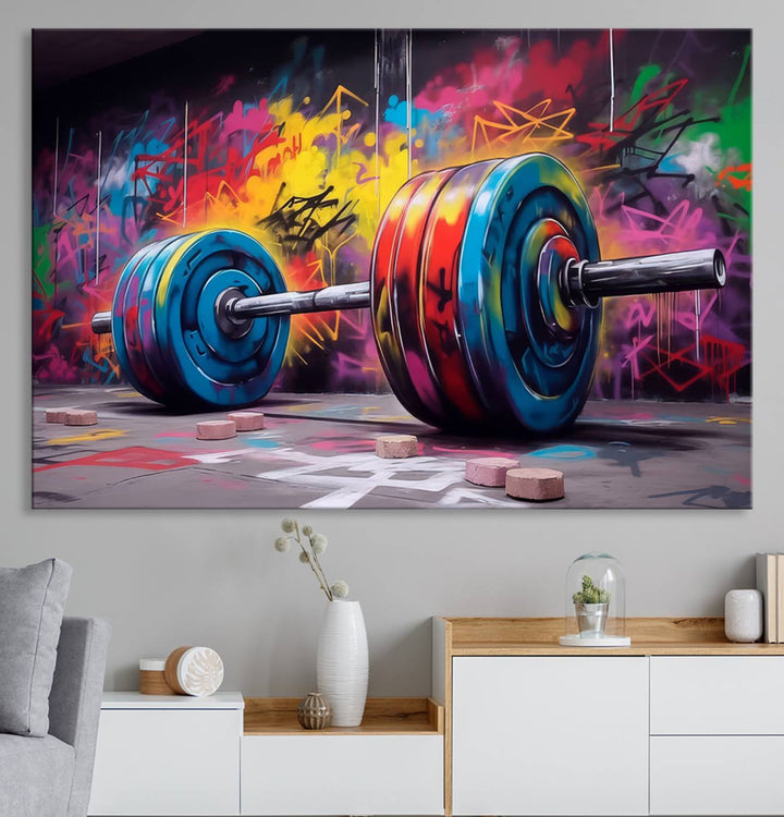 The Abstract Graffiti Barbell Canvas Wall Art is displayed on a porch.