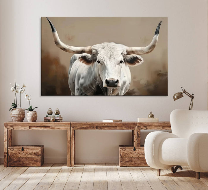 The kitchen features a striking canvas print of a Longhorn Bull.