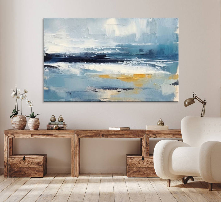 The Abstract Ocean Canvas Wall Art in coastal blue and gold enhances the modern kitchen.