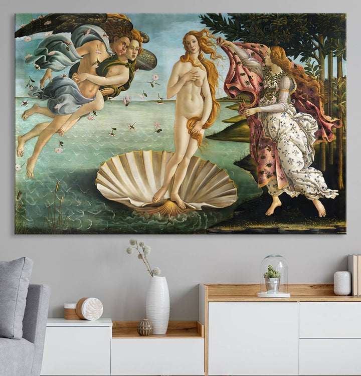 A canvas print of Botticellis The Birth of Venus is displayed on the wall.