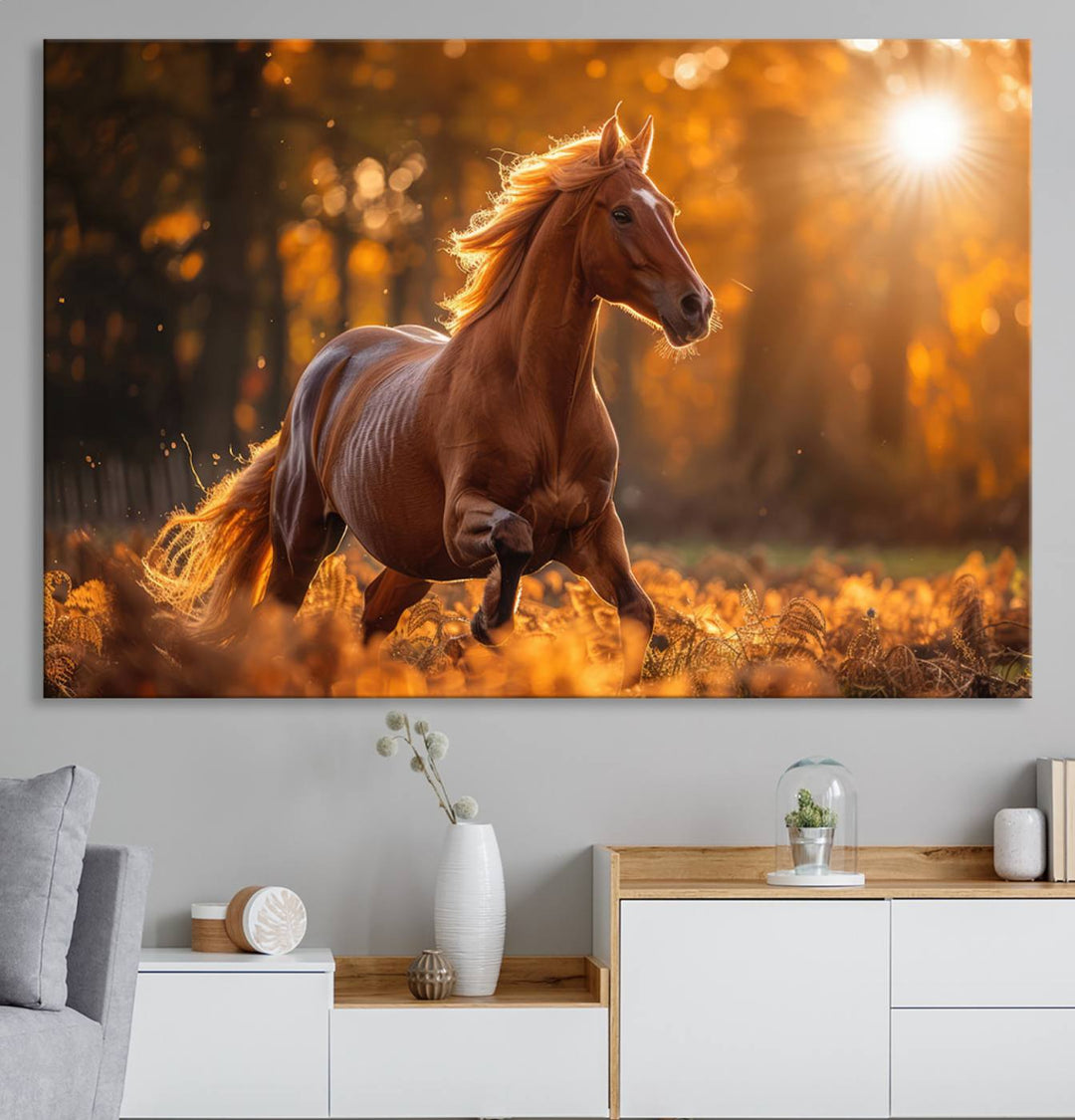 The Running Horse Sunset Forest Wall Art Canvas Print showcases a gallop in an autumn forest with sunlight streaming through the trees.