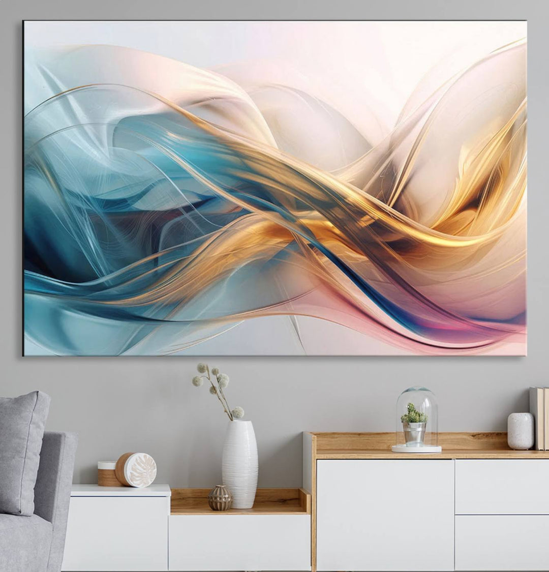 Abstract Flowing Colors Wall Art featuring blue, gold, and pink adds modern elegance to the space.