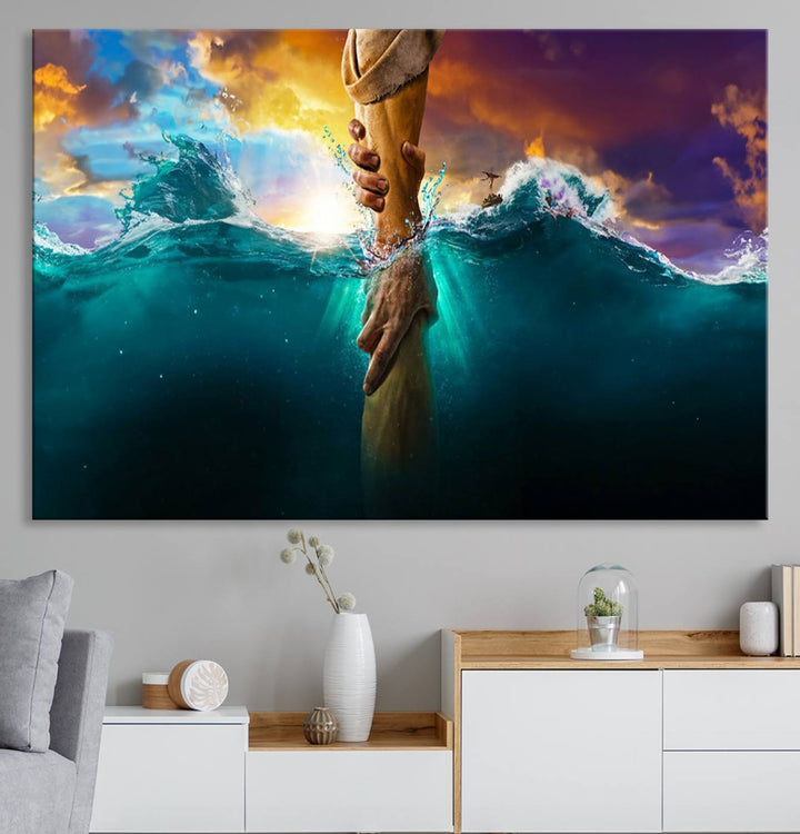 The God Hand Wall Art Canvas Print depicts hands reaching through water against a vibrant sky.