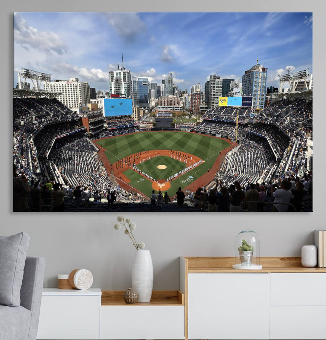 The San Diego Padres Baseball Canvas Print of Petco Park enhances the modern kitchen-dining area.