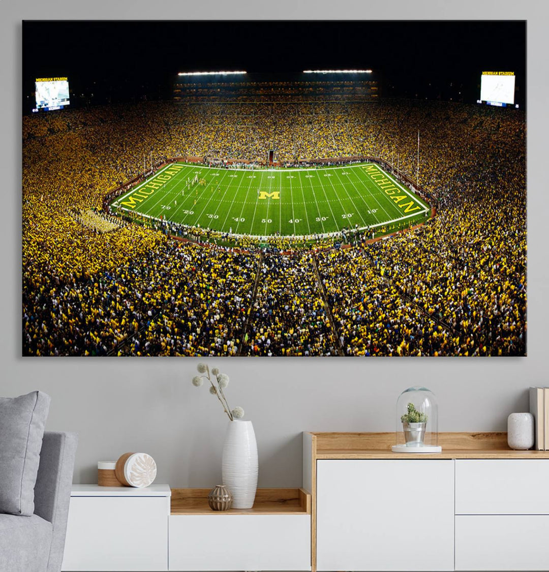 Aerial view of Michigan Stadium night game, ideal for Michigan Wolverines Football Team displayed on a triple canvas wall art.