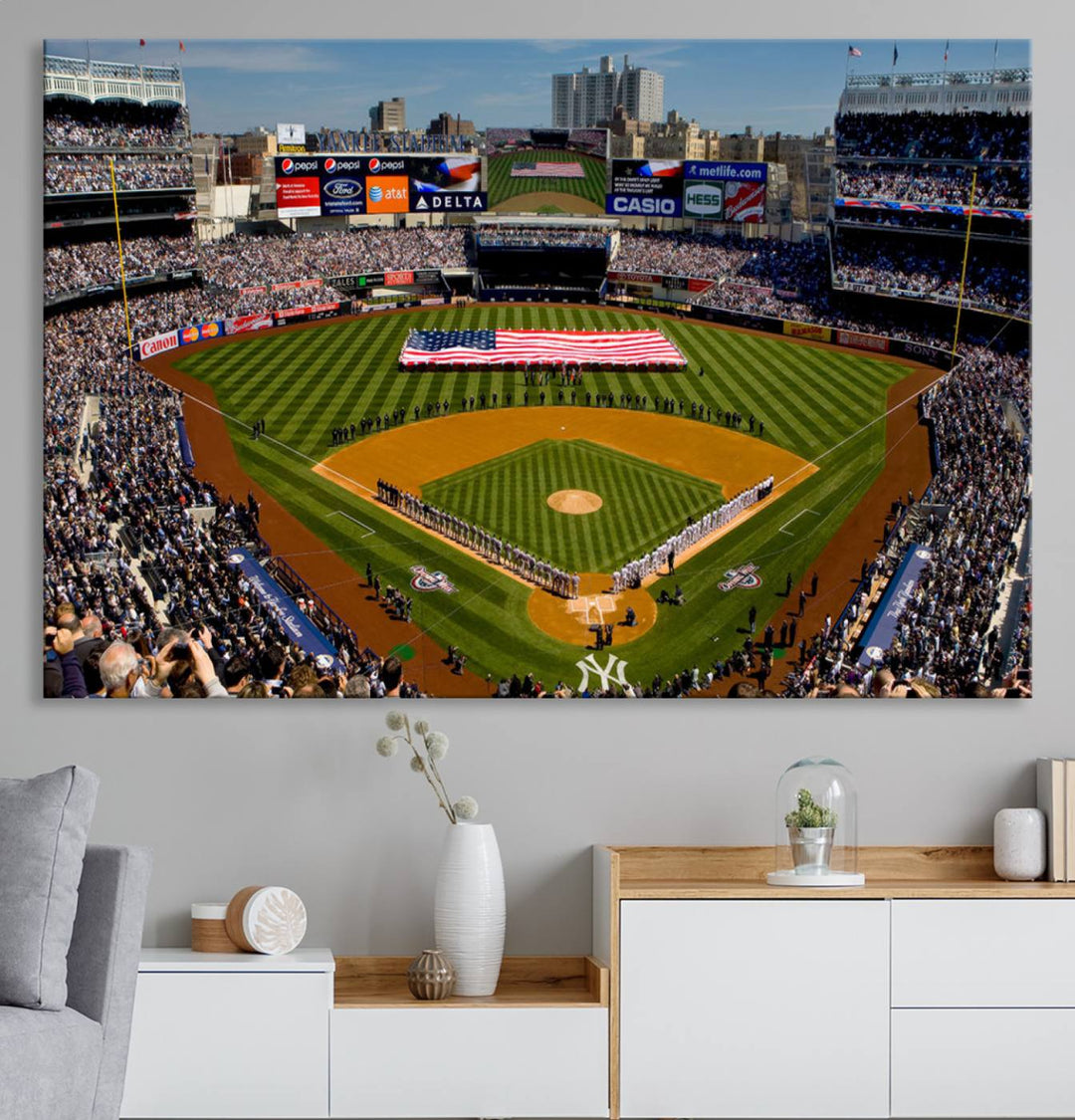 The Yankee Stadium New York wall art print features a vibrant scene of baseball fans with a large flag and players, expertly capturing the spirit of the game. This ready-to-hang décor is perfect for adding a dynamic touch to any space.