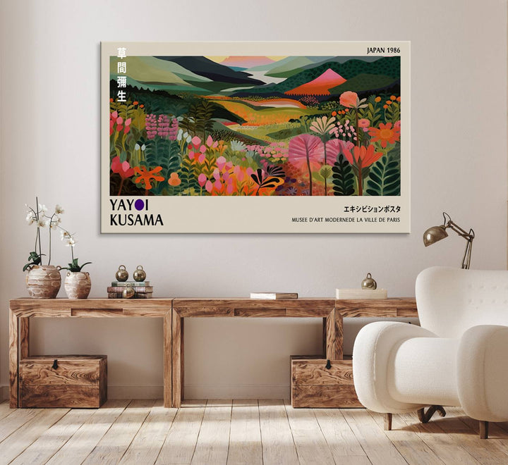 Yayoi Kusamas Landscape Canvas Print with vibrant floral mountain art adorns the wall.