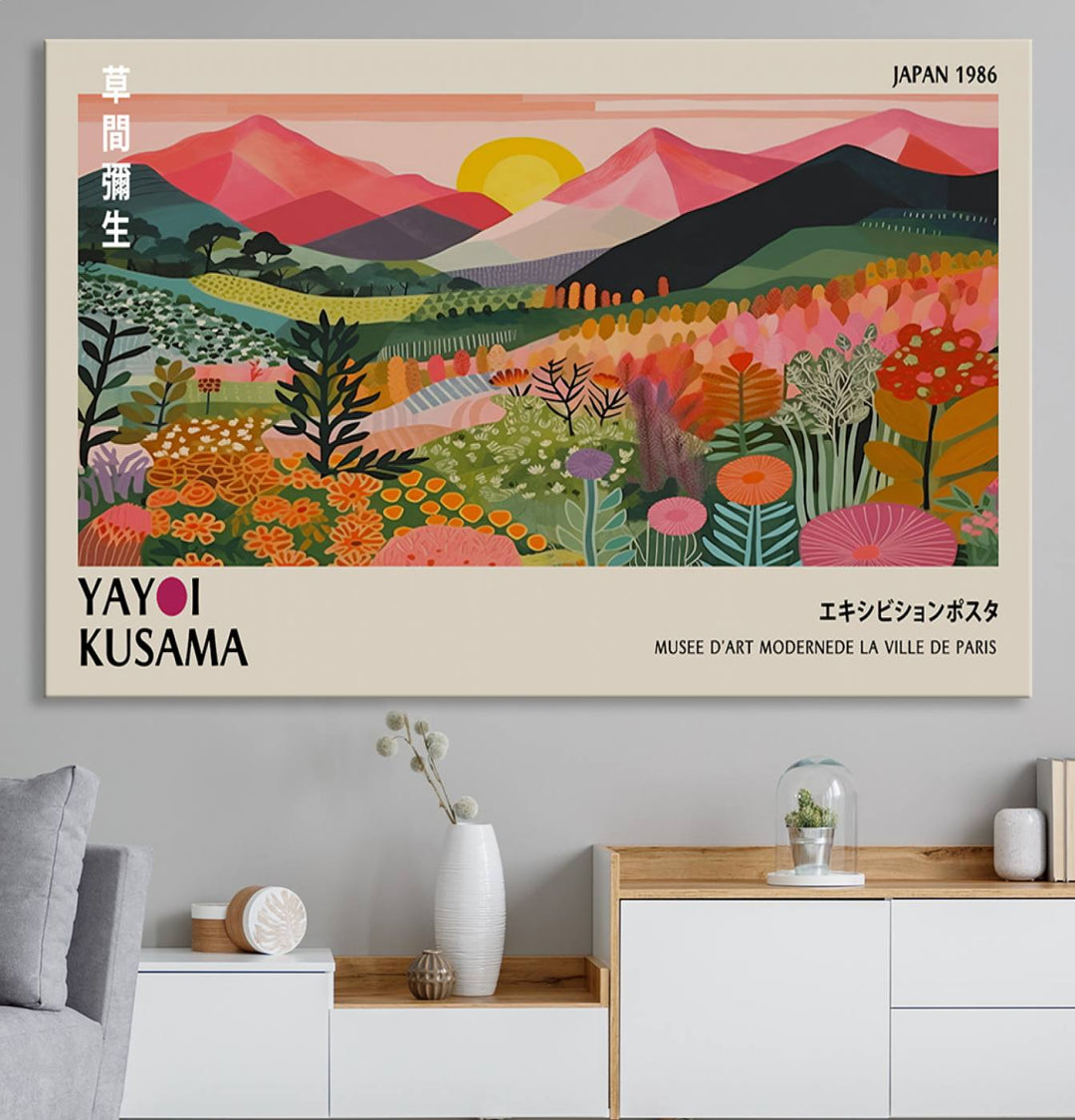 The wall art includes a vintage world map and Yayoi Kusamas colorful landscape.