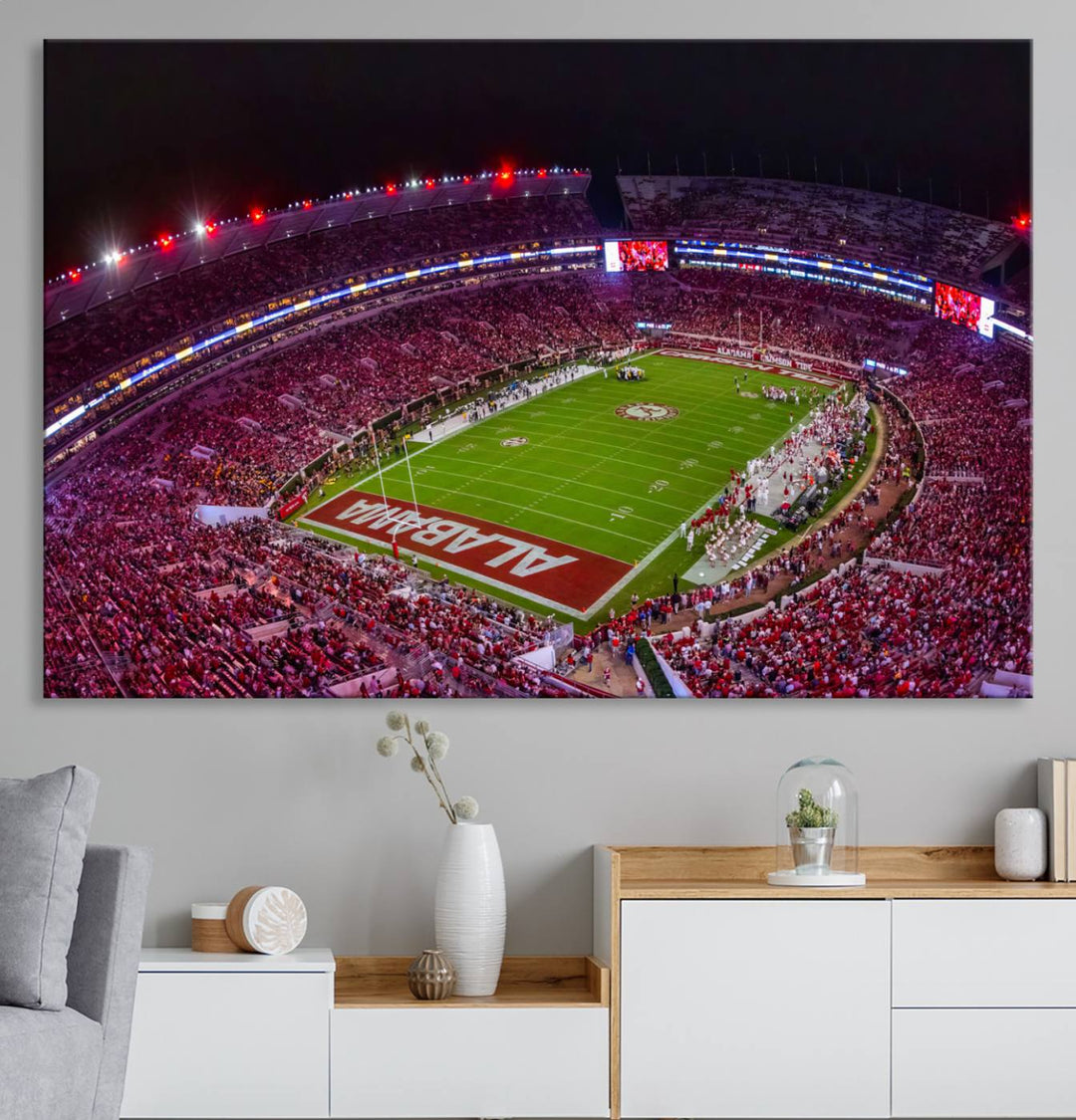 The living room features a Bryant-Denny Stadium Night Game Triple Canvas Wall Art.