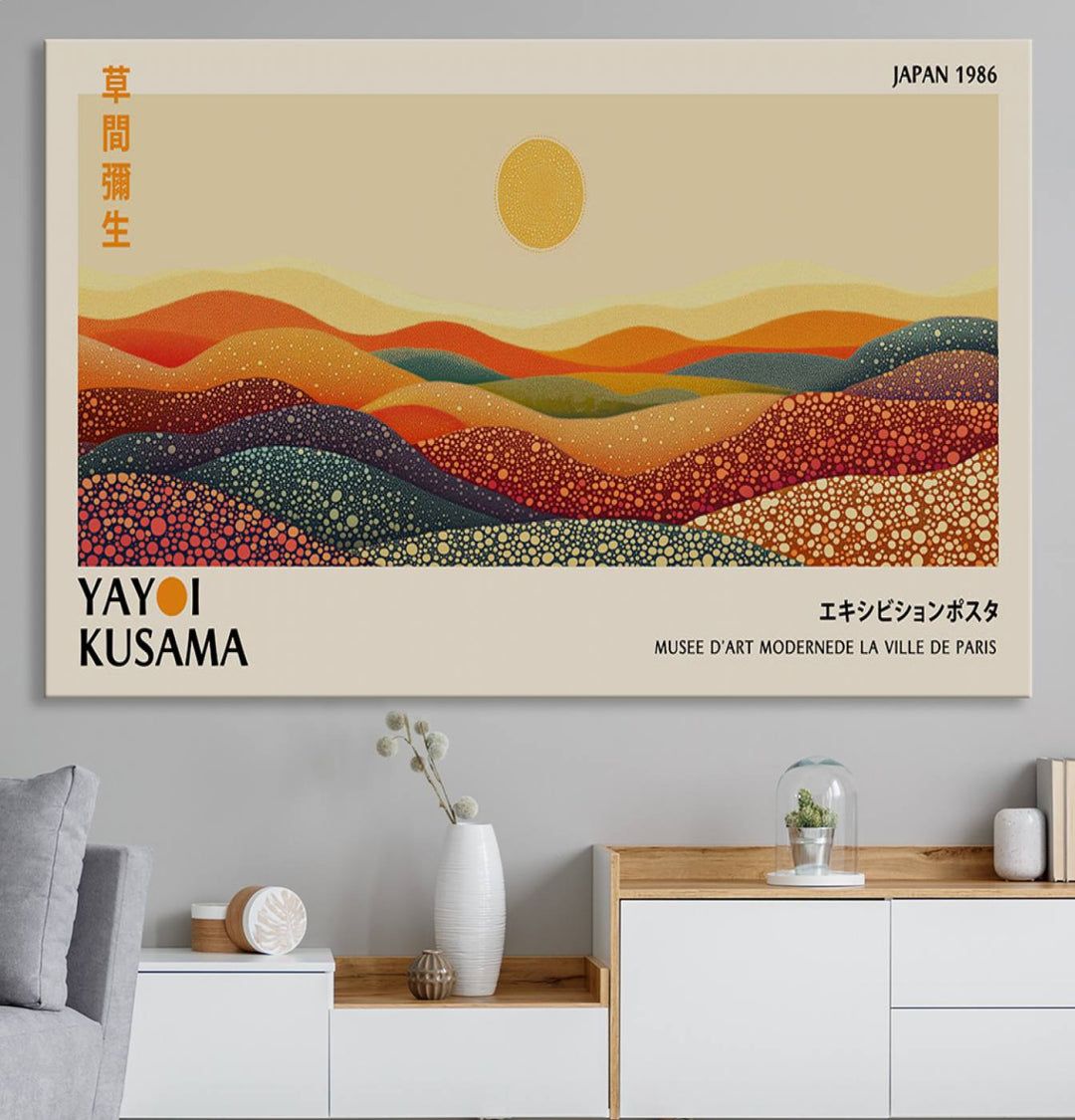 The Yayoi Kusama Wall Art Print is a vibrant abstract landscape canvas featuring colorful dotted hills and a sun, showcasing Japanese art and signed by Yayoi Kusama. It is dated Japan 1986.