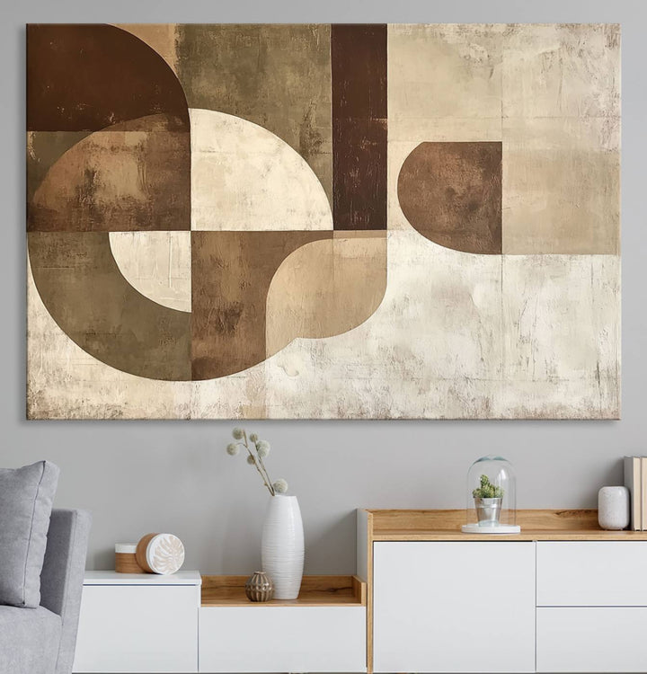 A Wabi Sabi Geometric Minimalist Wall Art Canvas Print—with a modern abstract geometric design in brown and beige tones—stands proudly in front of a house.