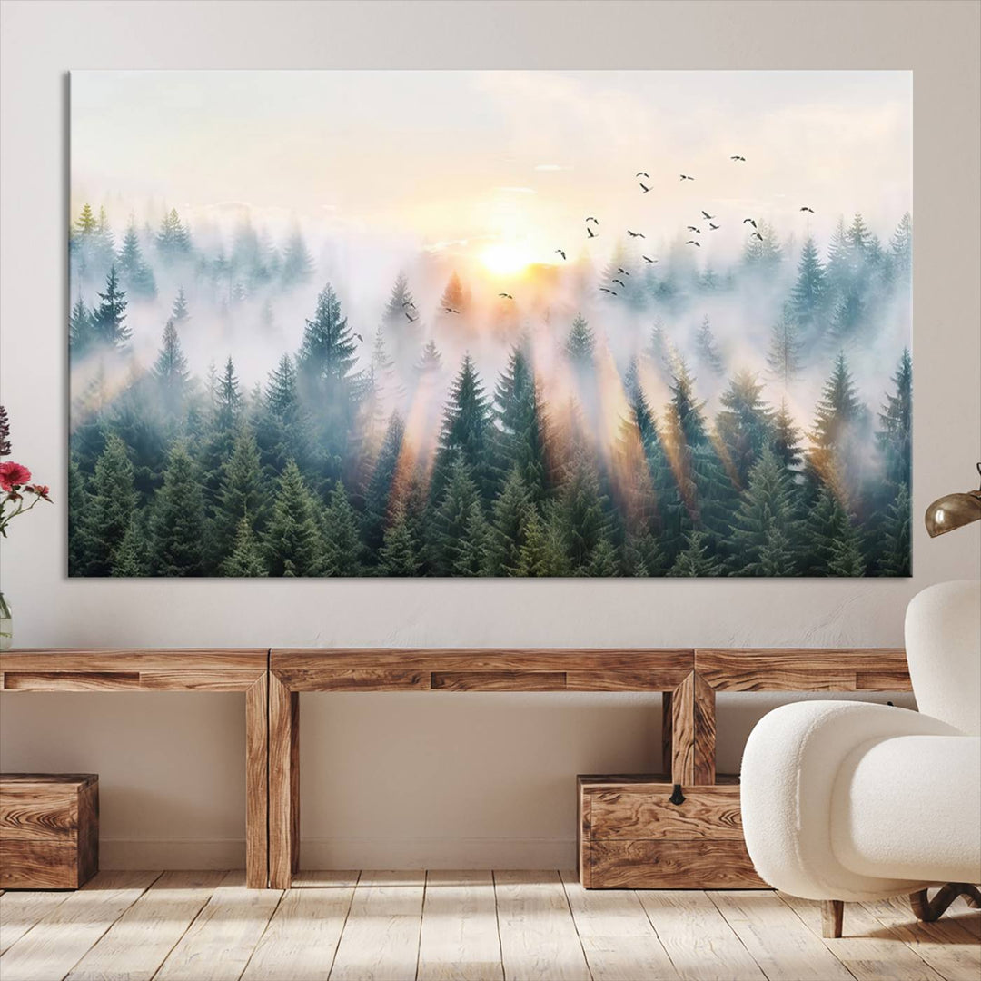 Misty Pine Forest Wall Art: A depiction of sunrise over foggy trees and birds against a bright sky; a framed woodland scene ideal for home or office decor.