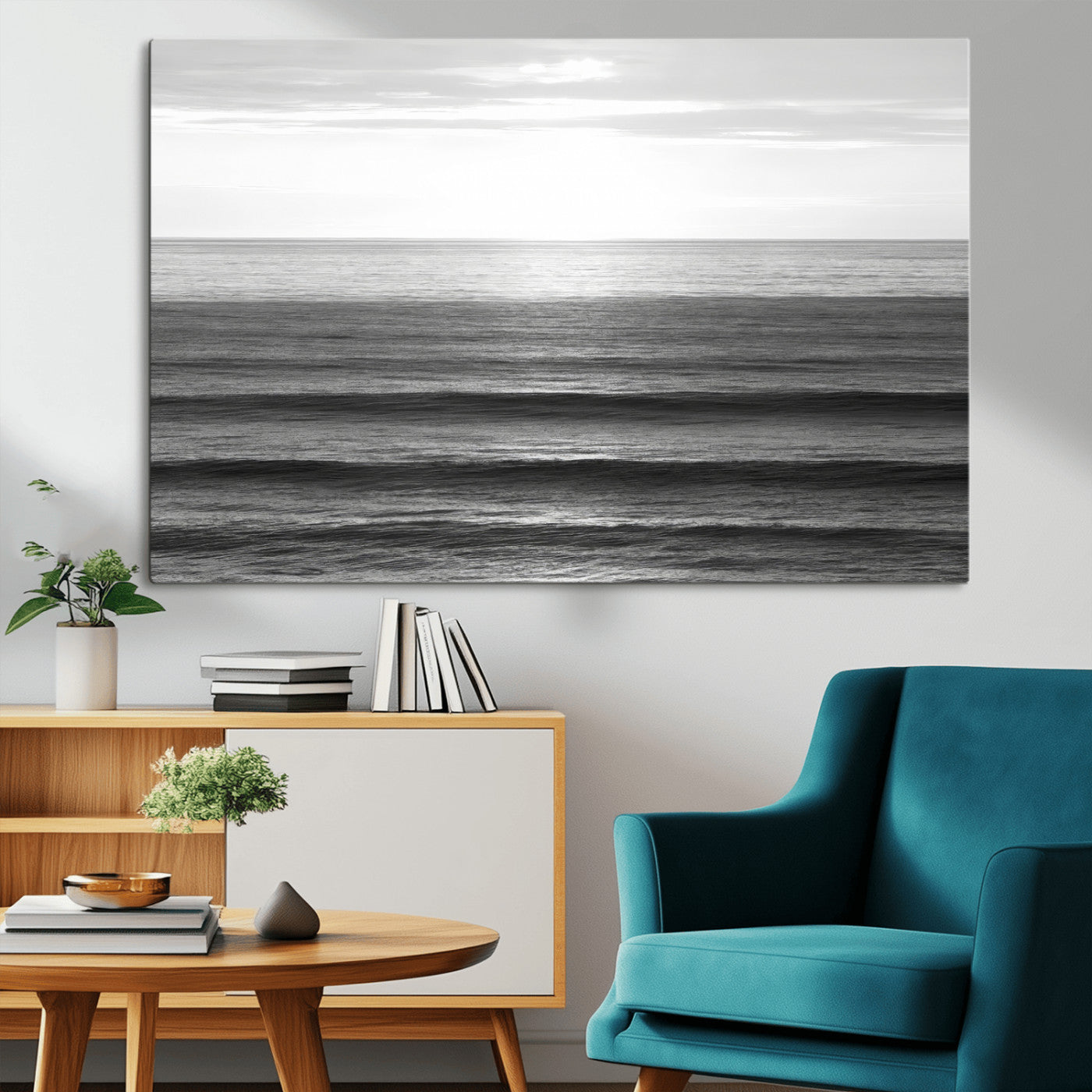 Minimalist black and white ocean view with layered waves reflecting sunlight, evoking a sense of calm and coastal serenity.