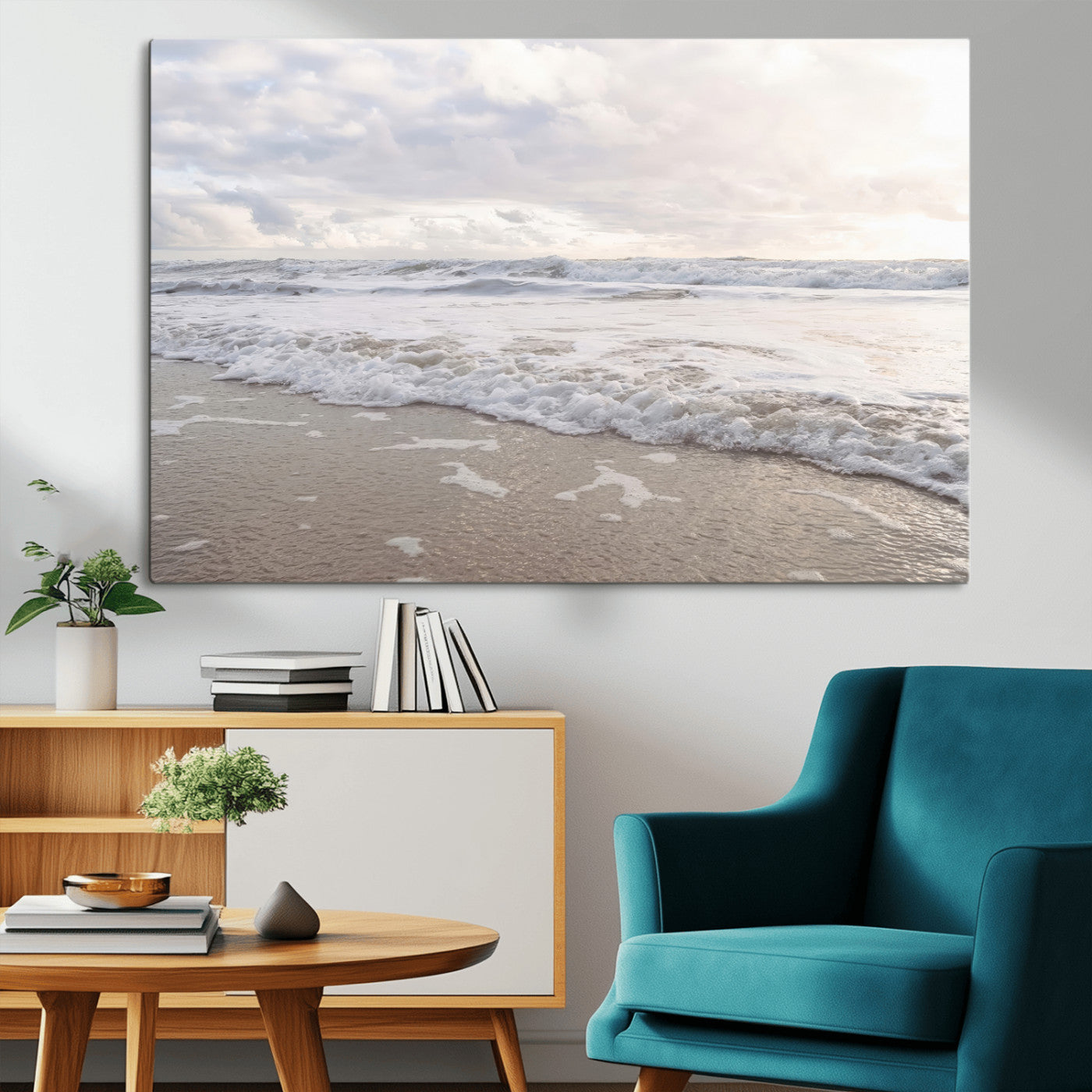 Peaceful ocean waves rolling onto the sandy shore under soft light, perfect for neutral or coastal minimalist decor themes.