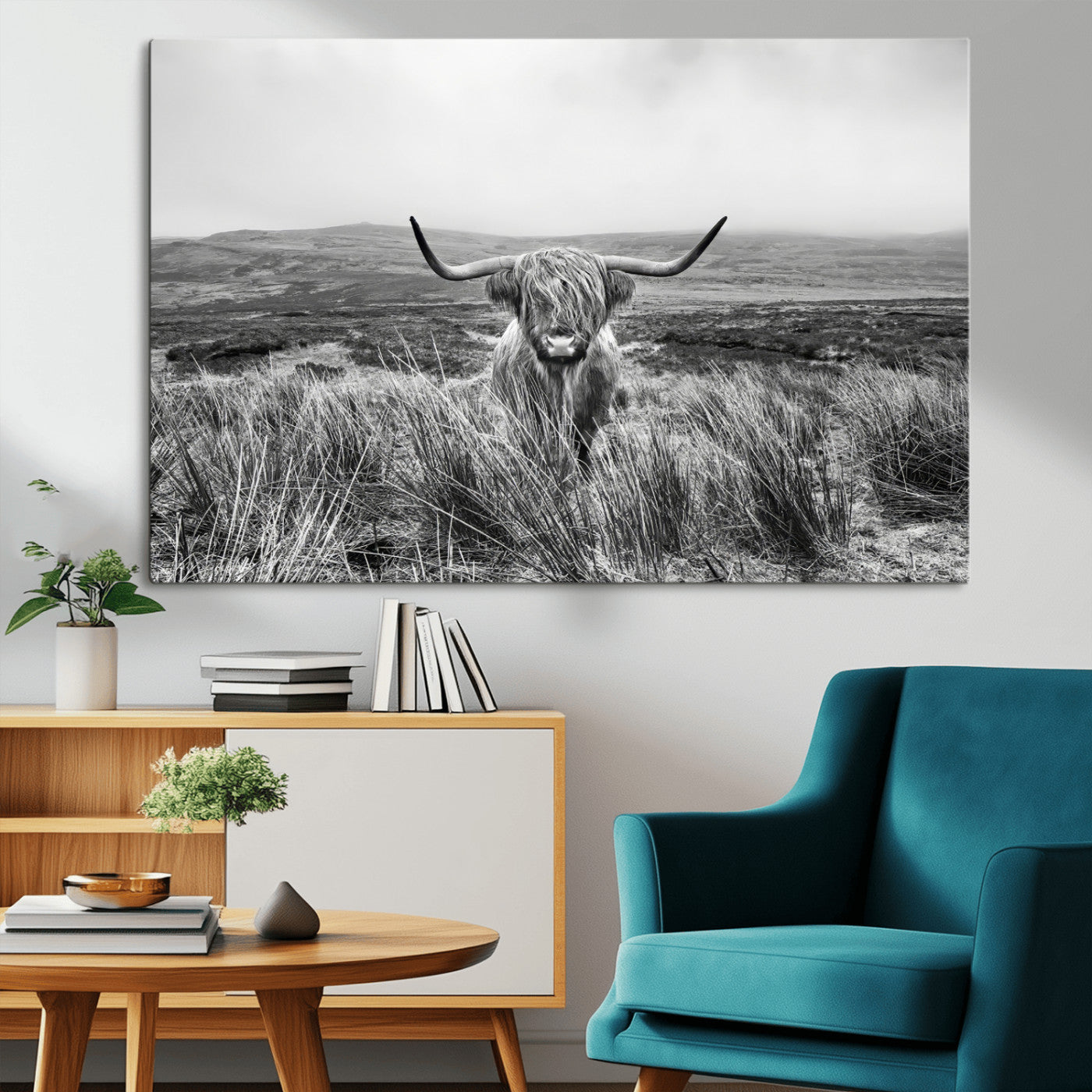 A black and white portrait of a Highland cow in a foggy Scottish countryside, capturing a rustic aesthetic and tranquil farm escape.