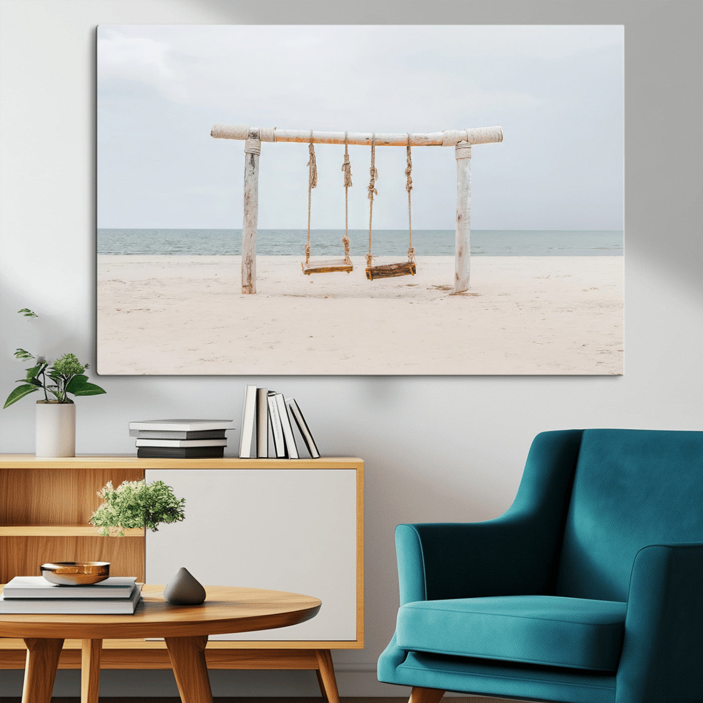 A rustic wooden beach swing stands on a serene sandy shore with an ocean horizon in the background, creating a tranquil and dreamy coastal escape.