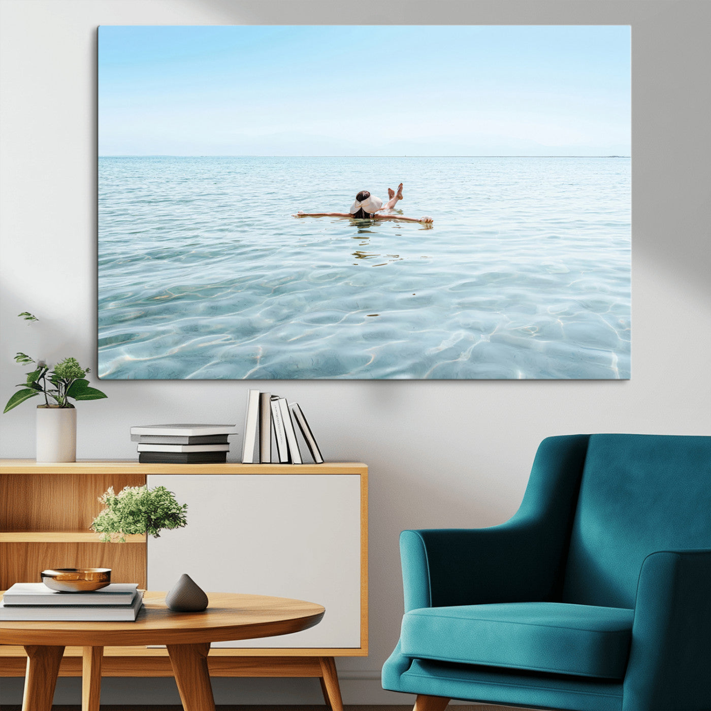 A peaceful minimalist scene of a person floating on crystal-clear water, surrounded by a vast open horizon, capturing relaxation and serenity in a tranquil aquatic setting.